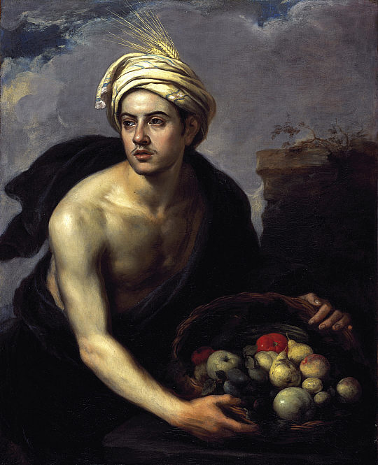Young man with basket of fruit