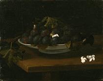 Plums, Figs and Grape Leaves in a Dish with Blossoms on a Table - Феде Галиция